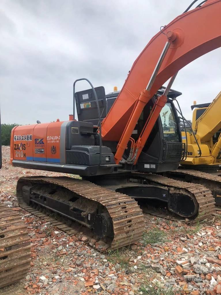 Hitachi ZX 210 Beltegraver