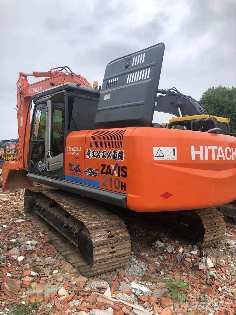 Hitachi ZX 210 Beltegraver