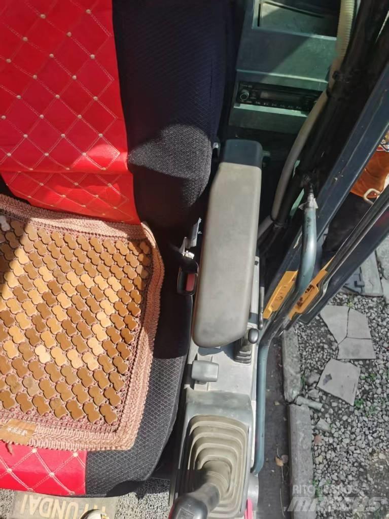 Hyundai 210w-9 Hjulgravere