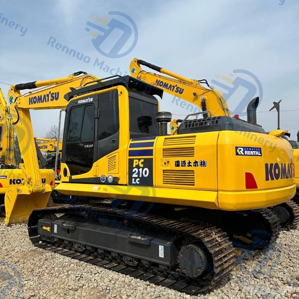 Komatsu PC 210-8 Beltegraver