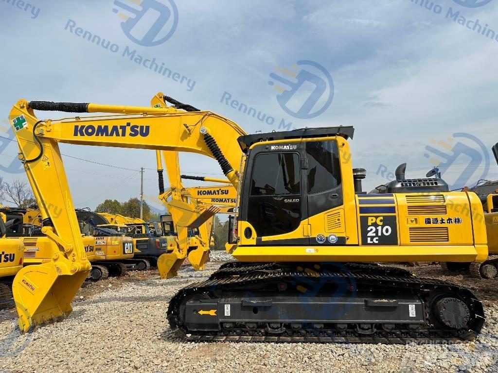 Komatsu PC 210-8 Beltegraver