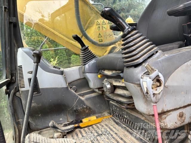 Komatsu PC 210 Beltegraver