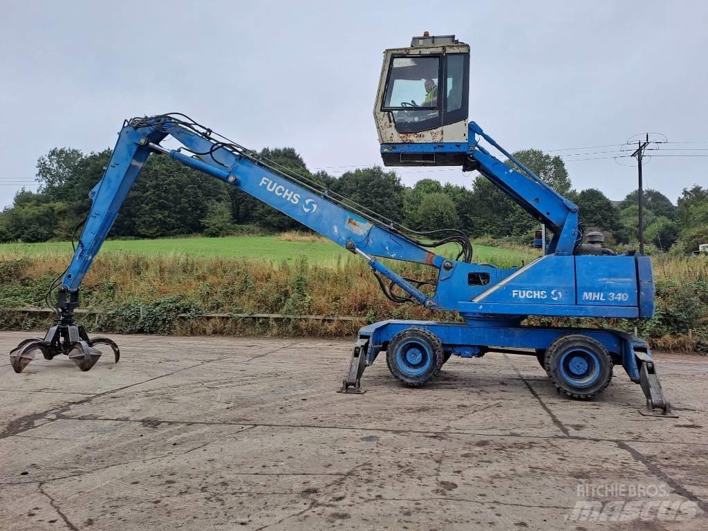 Fuchs MHL 340 Gravemaskiner for avfallshåndtering