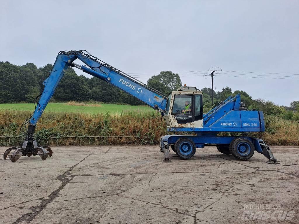 Fuchs MHL 340 Gravemaskiner for avfallshåndtering