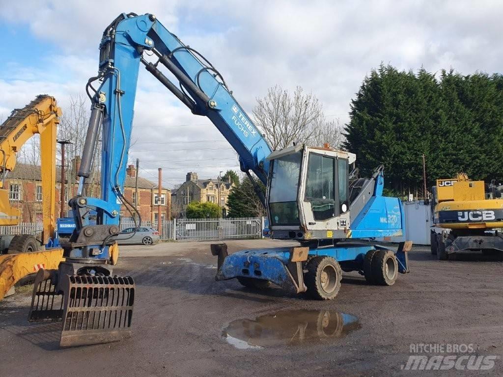 Fuchs MHL 320 Gravemaskiner for avfallshåndtering