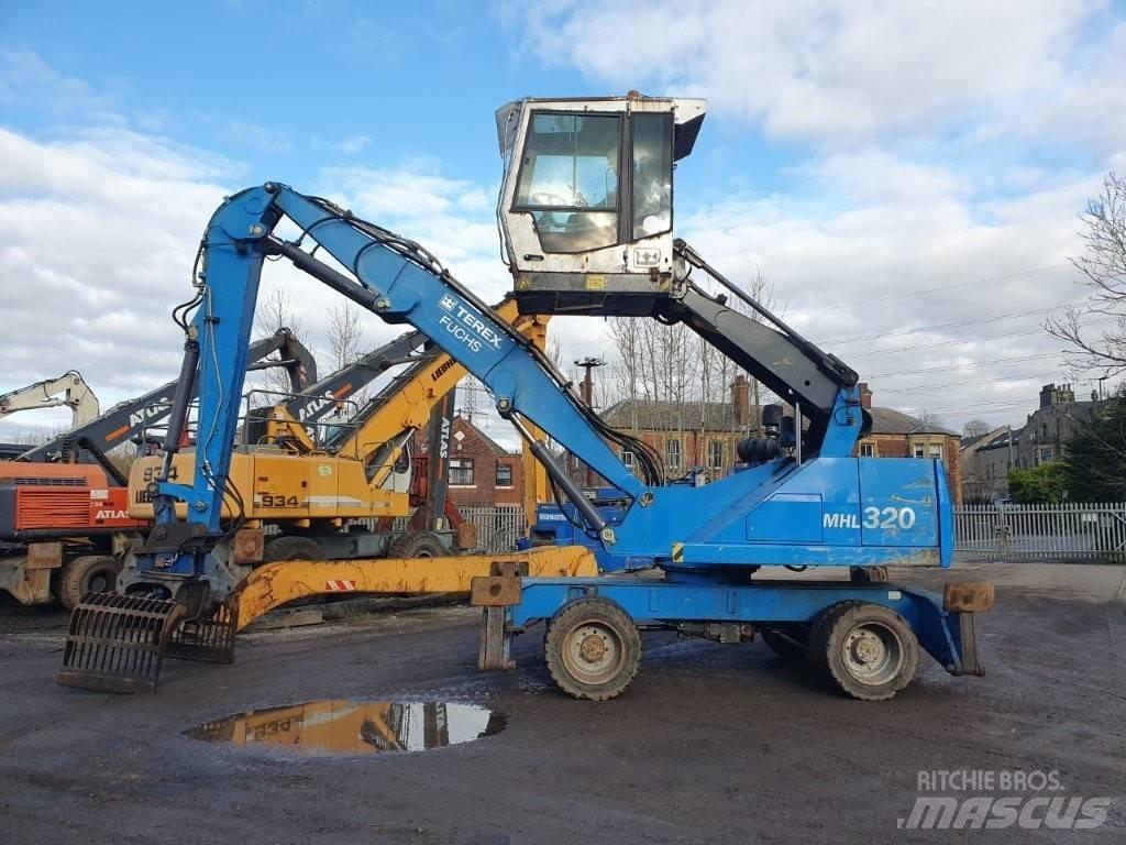 Fuchs MHL 320 Gravemaskiner for avfallshåndtering