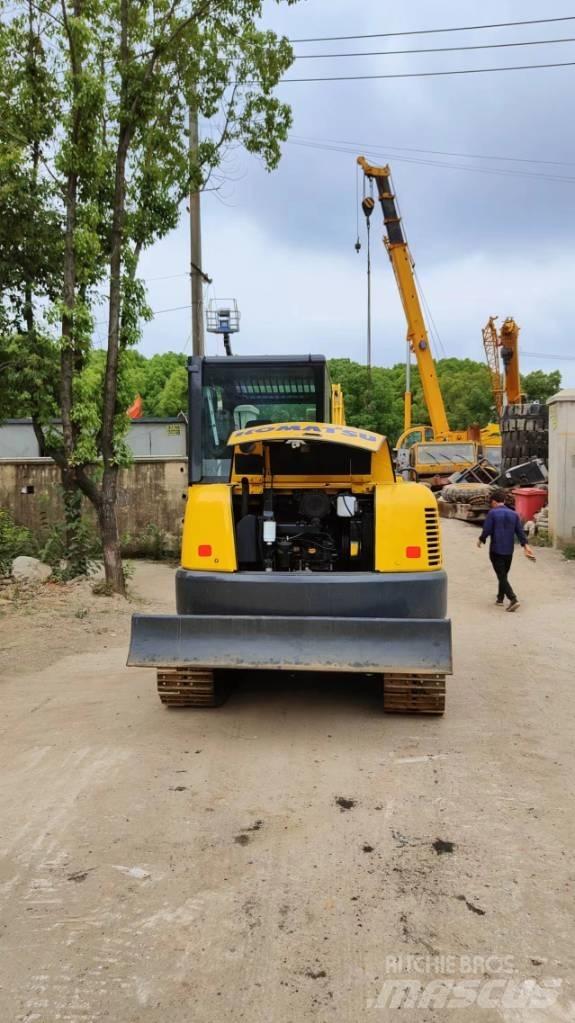 Komatsu 56 Beltegraver