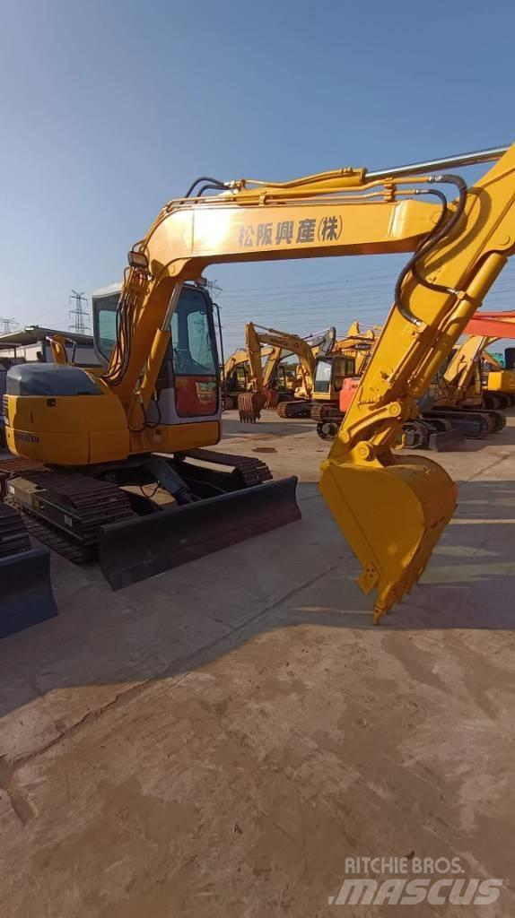 Komatsu PC 78 US Beltegraver