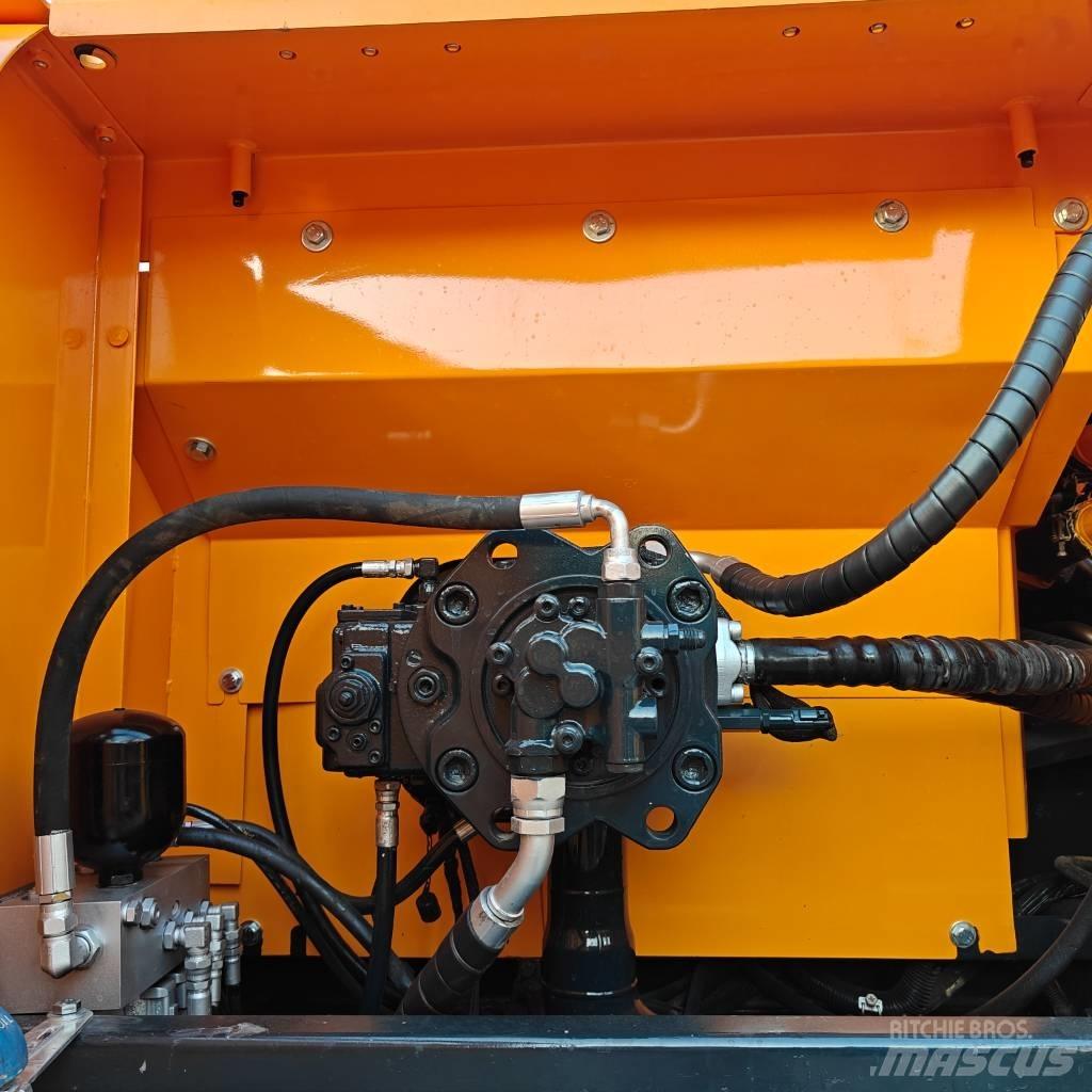 Hyundai 305-9T Beltegraver