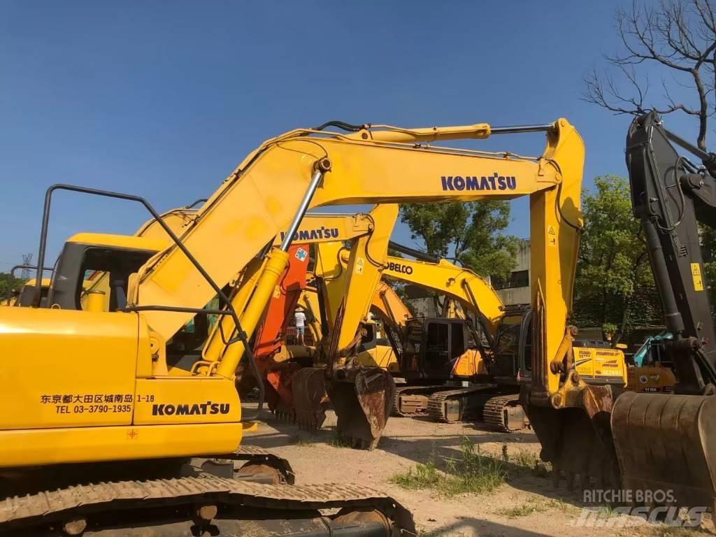 Komatsu PC220-7 Beltegraver