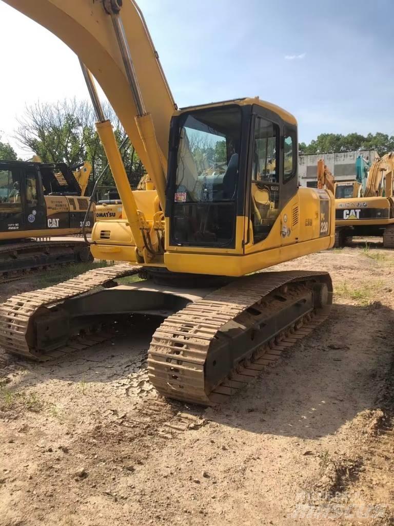 Komatsu PC220-7 Beltegraver