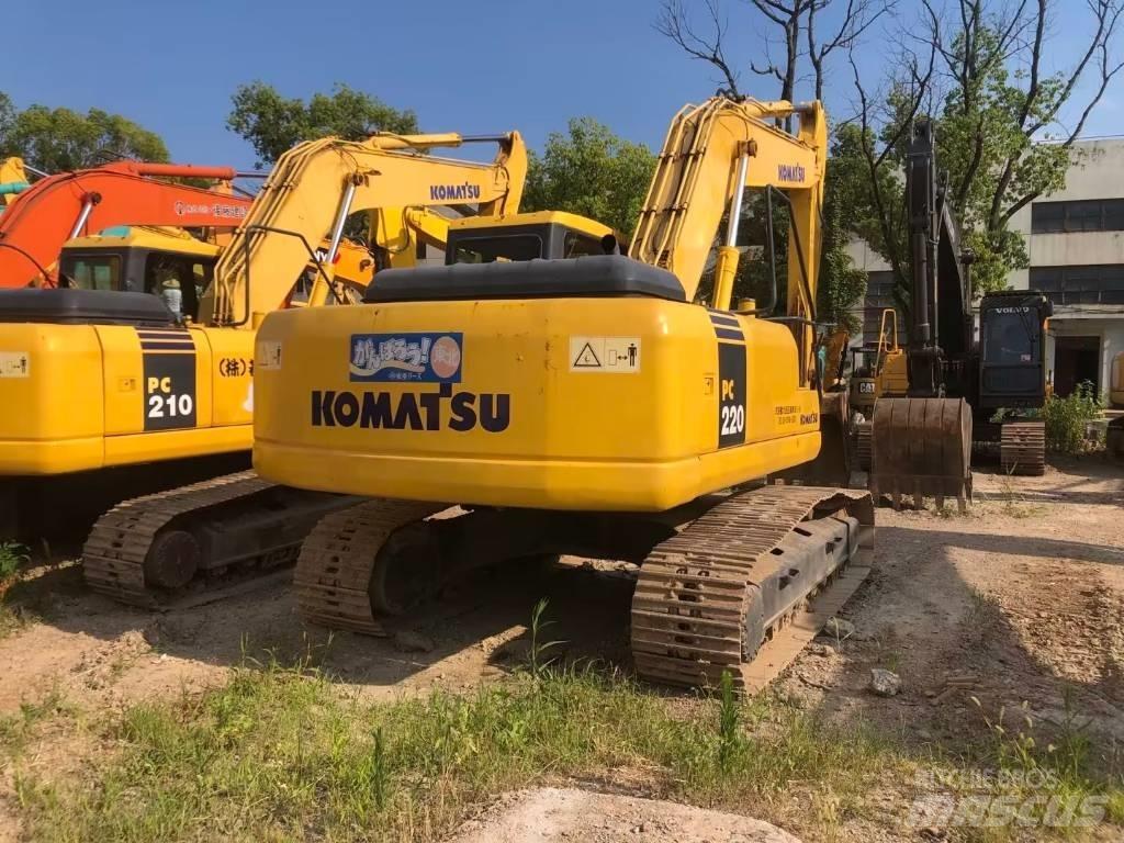 Komatsu PC220-7 Beltegraver
