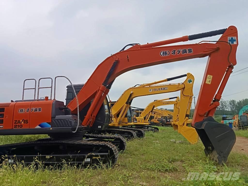 Hitachi ZX 210 Beltegraver