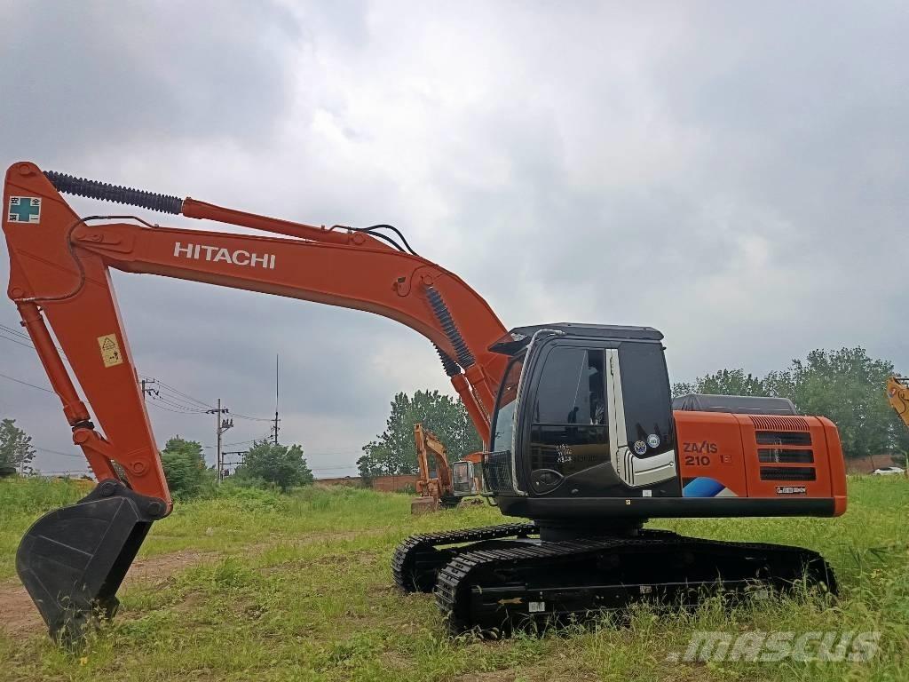 Hitachi ZX 210 Beltegraver