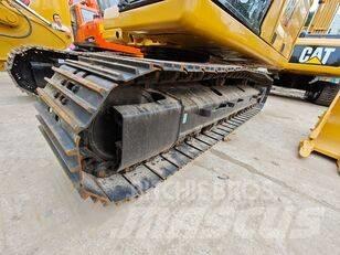 CAT 323 Beltegraver