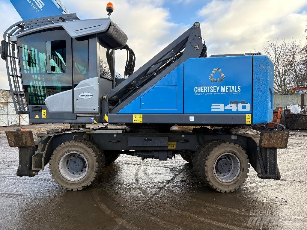 Fuchs MHL 340 Gravemaskiner for avfallshåndtering