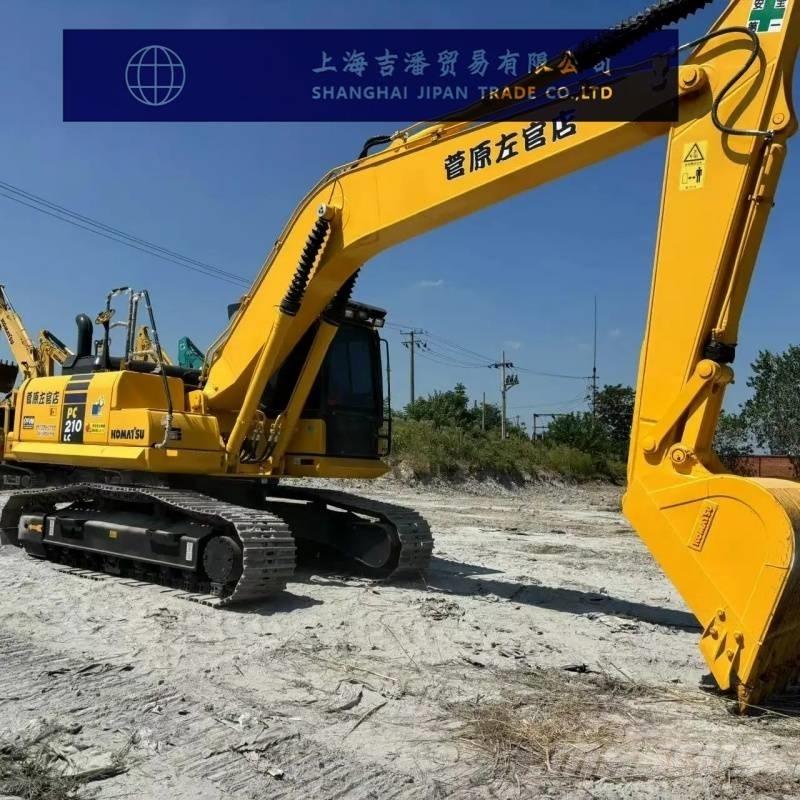 Komatsu PC 210 Beltegraver