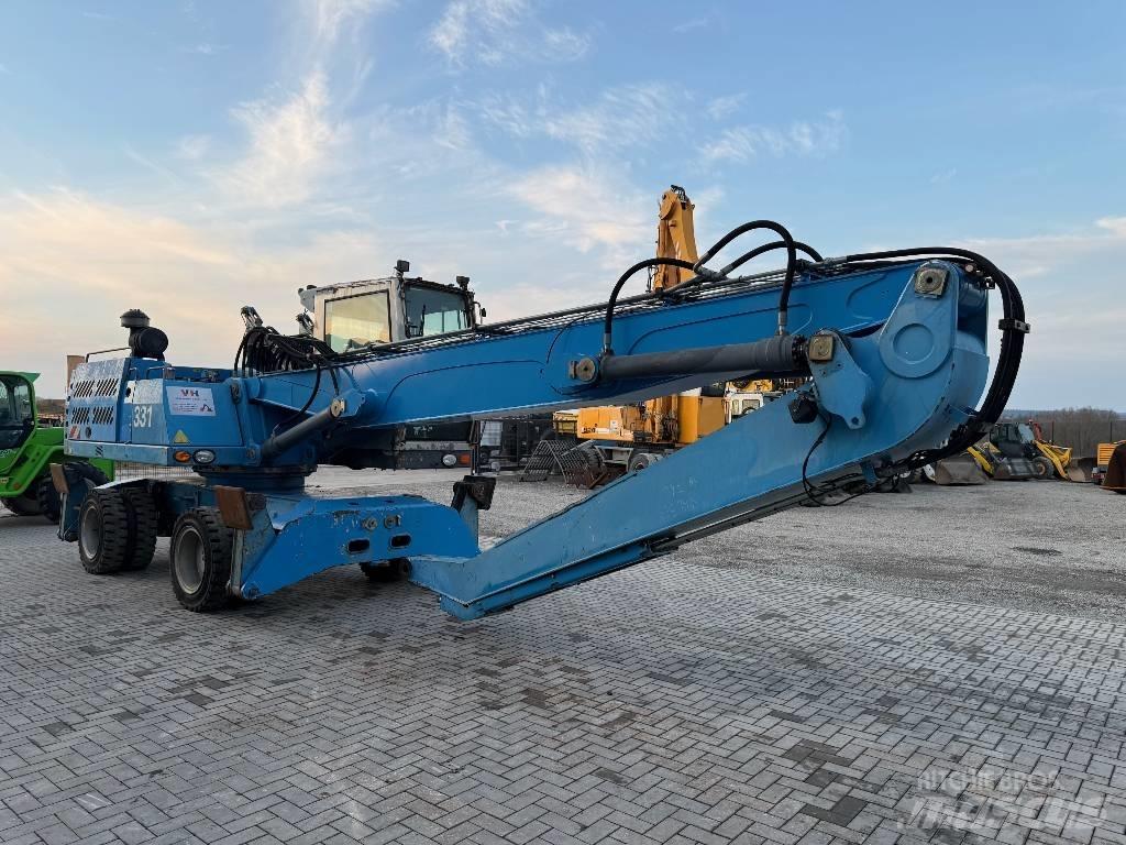 Fuchs MHL 331 Gravemaskiner for avfallshåndtering