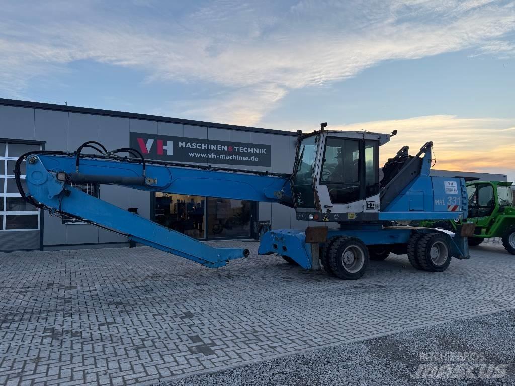 Fuchs MHL 331 Gravemaskiner for avfallshåndtering