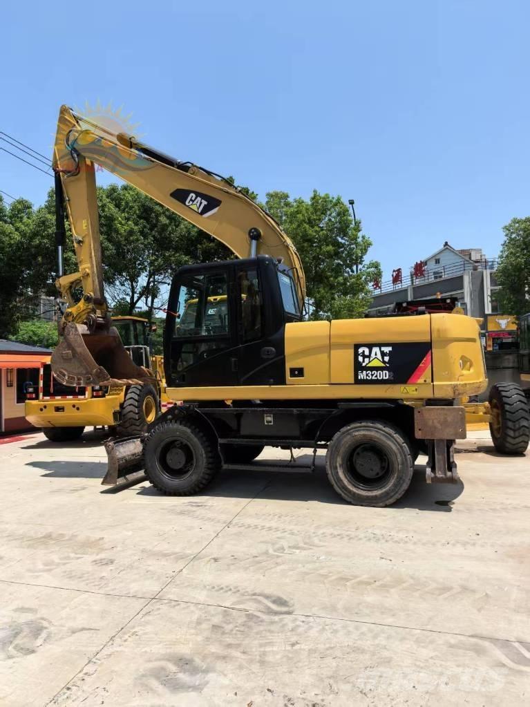 CAT M 320D2 Hjulgravere