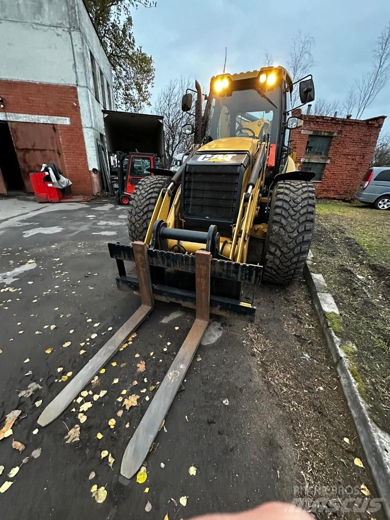 CAT 444F Traktorgravere