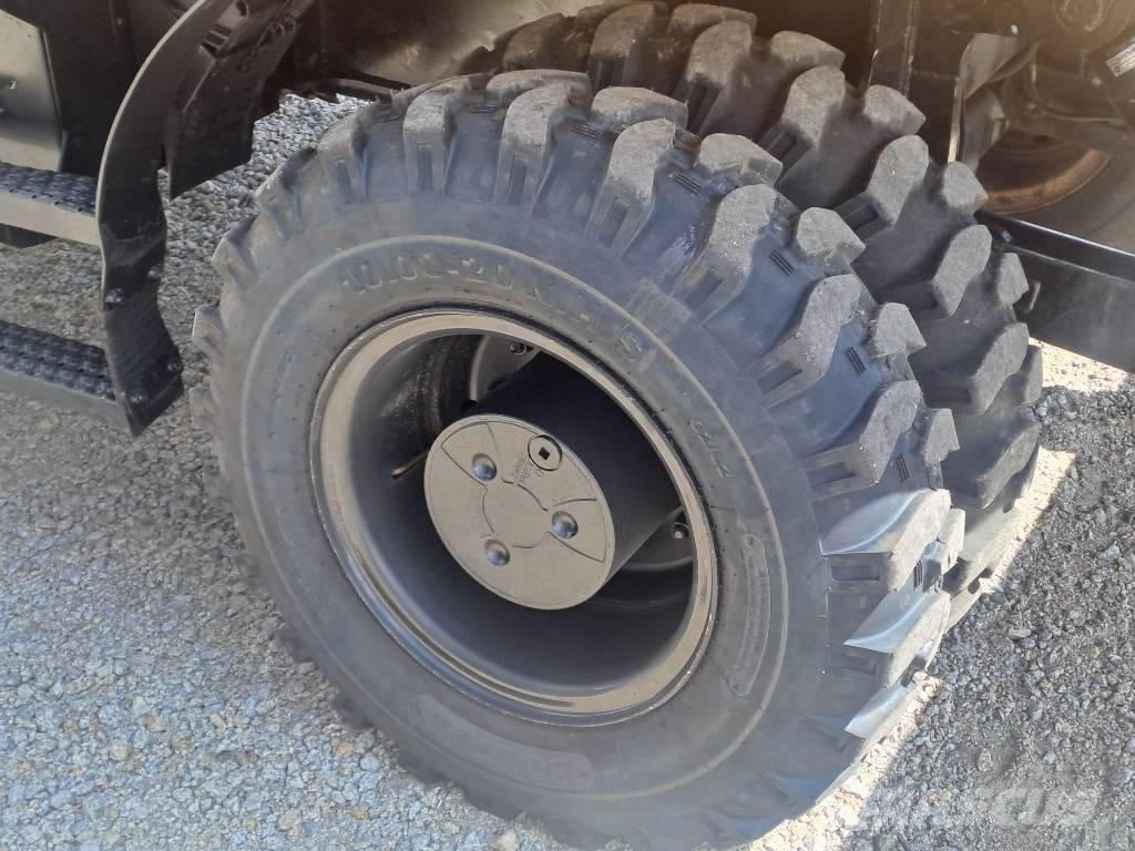 CAT M318F Hjulgravere