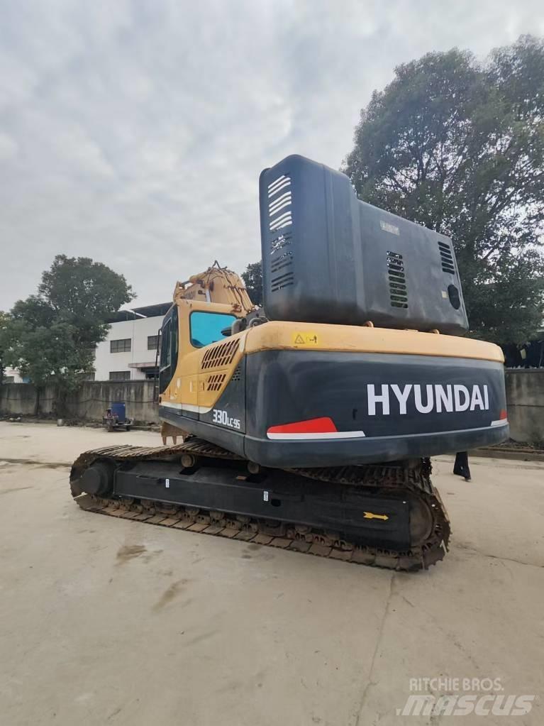 Hyundai 330LC-9S Beltegraver