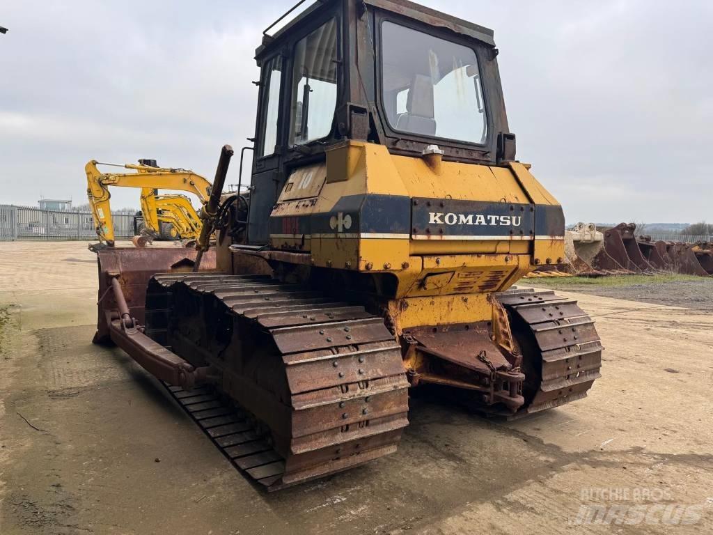 Komatsu D63E-1 Dozere Beltegående