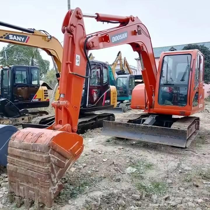 Doosan DH70-7 Beltegraver