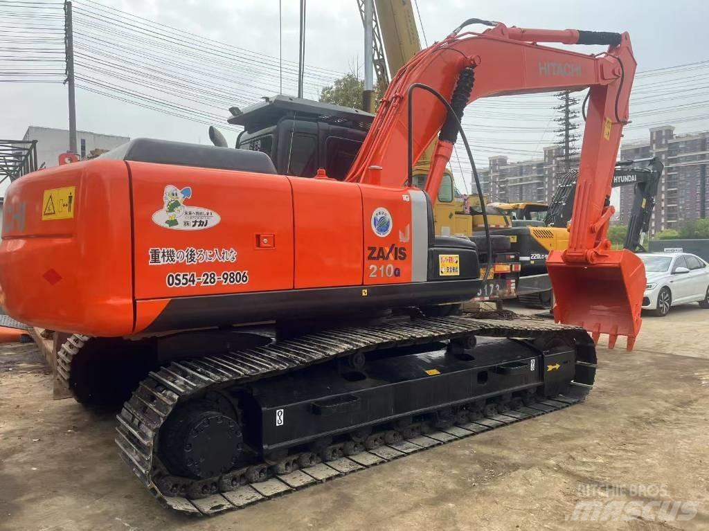 Hitachi 210LC Beltegraver