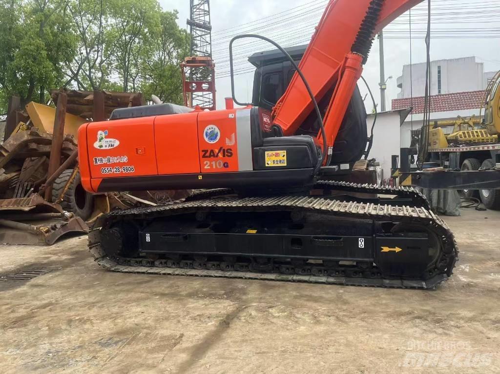 Hitachi 210LC Beltegraver