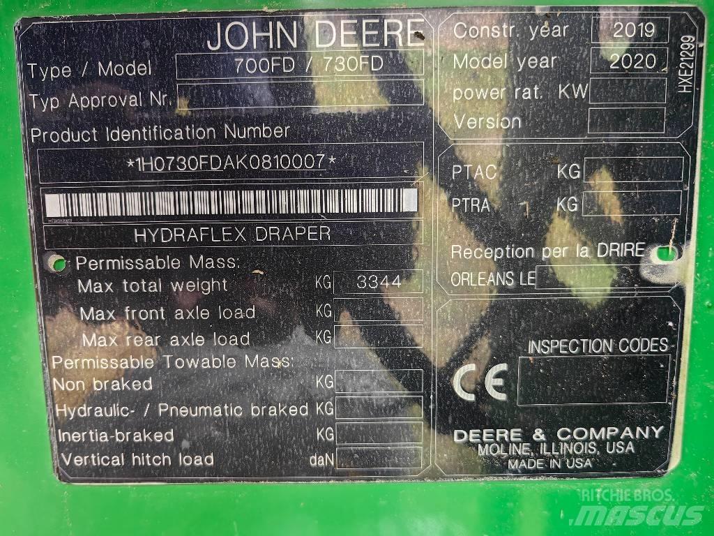 John Deere T 670 i Skurtreskere