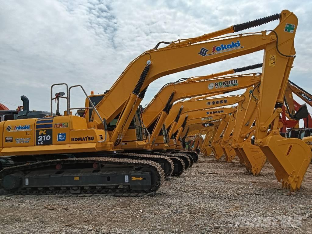 Komatsu PC 210 Beltegraver