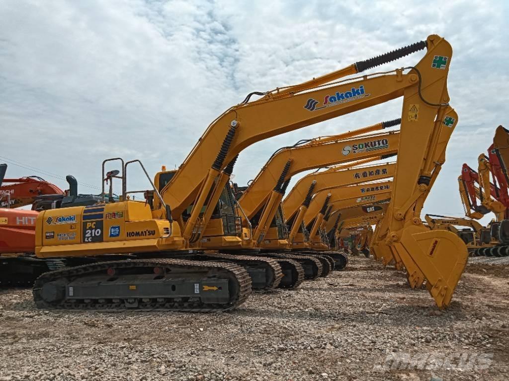 Komatsu PC 210 Beltegraver