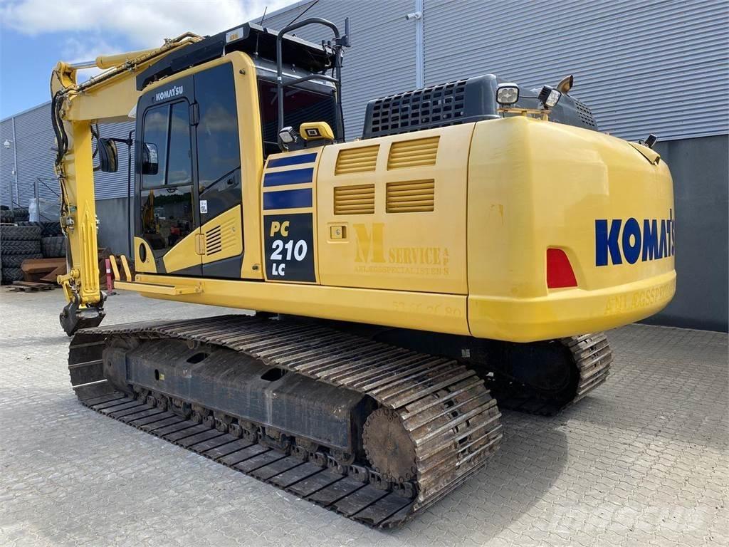 Komatsu PC210LC-11 Beltegraver
