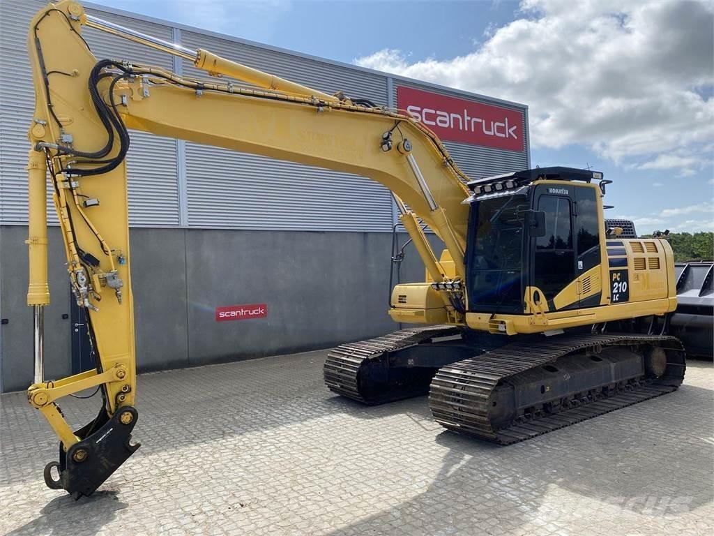 Komatsu PC210LC-11 Beltegraver