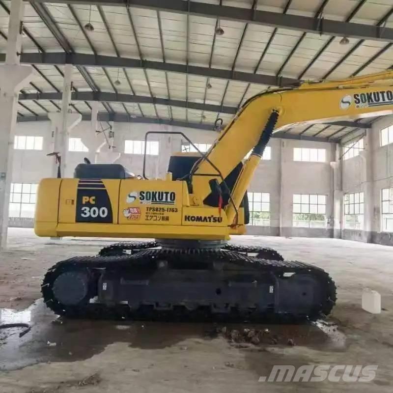 Komatsu PC300-7 Beltegraver