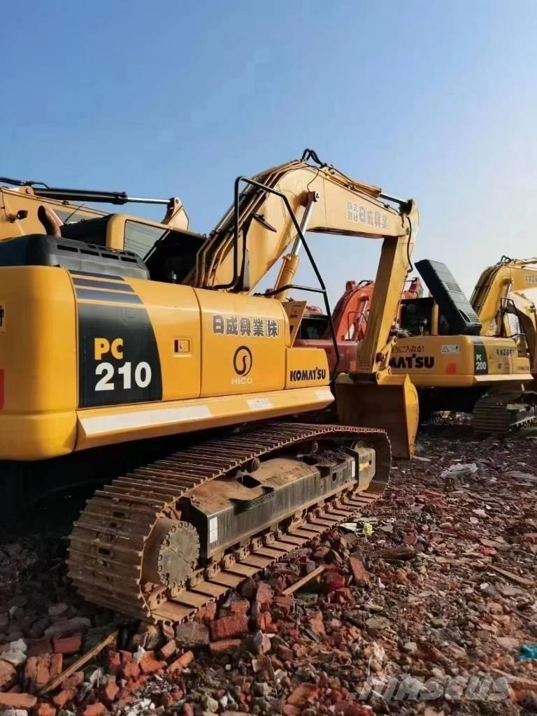 Komatsu pc 210 Beltegraver