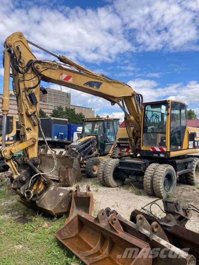 CAT M 312 Hjulgravere