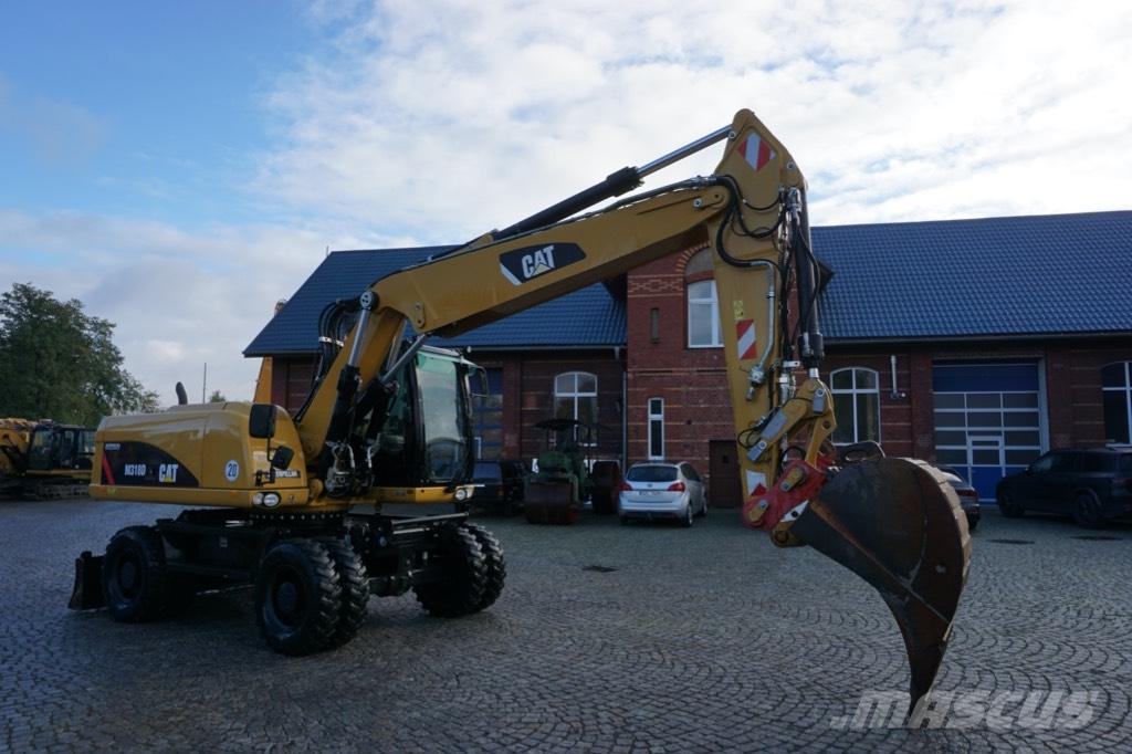 CAT M 318 D Hjulgravere