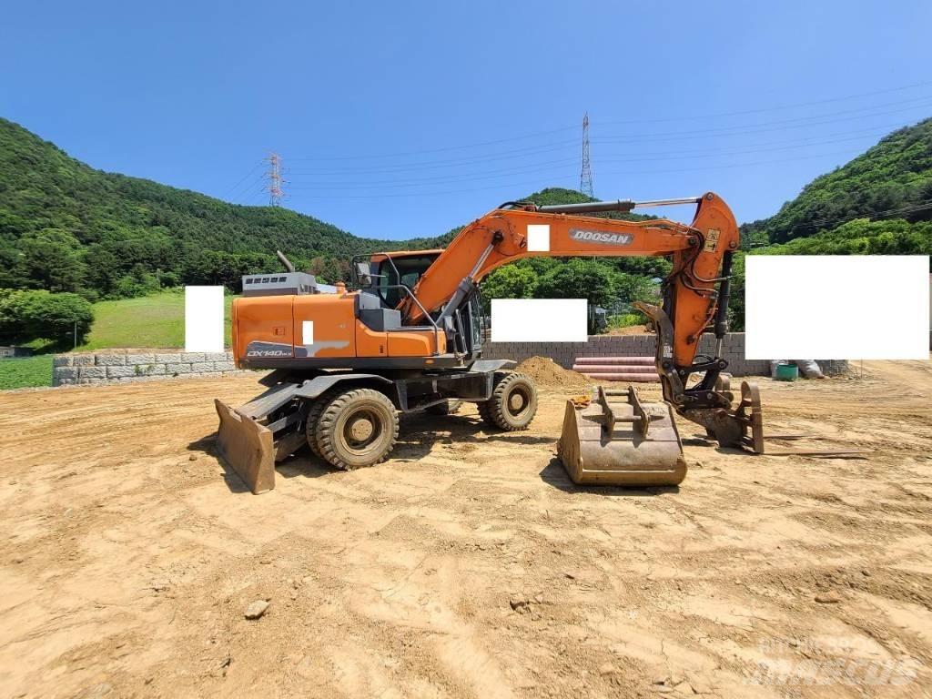 Doosan DX 140 W Hjulgravere