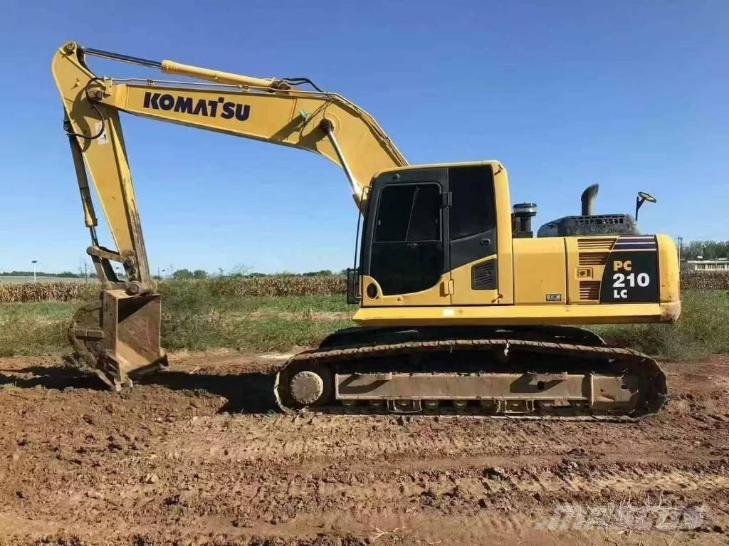 Komatsu PC 210 Beltegraver