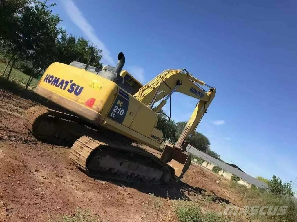 Komatsu PC 210 Beltegraver