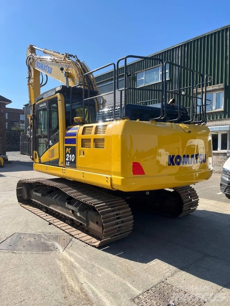 Komatsu PC210LC-11E0 Beltegraver