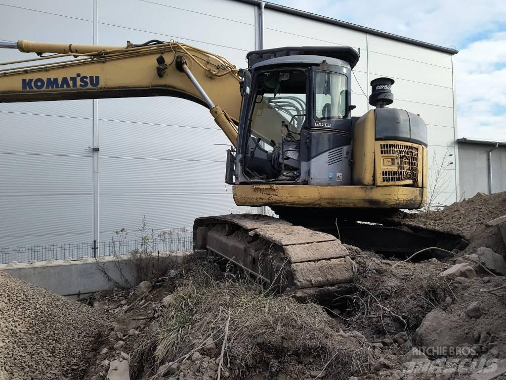 Komatsu 228 Beltegraver