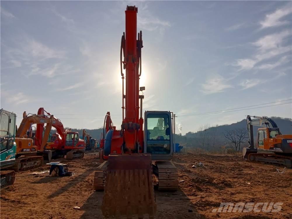 Hitachi ZX135US Beltegraver