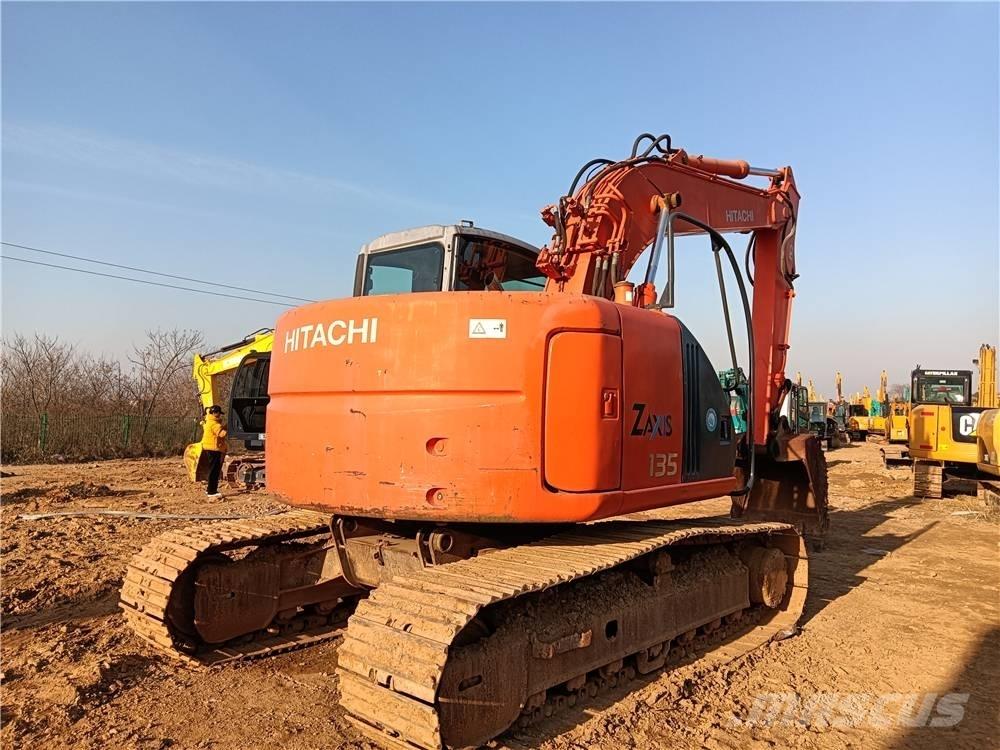 Hitachi ZX135US Beltegraver
