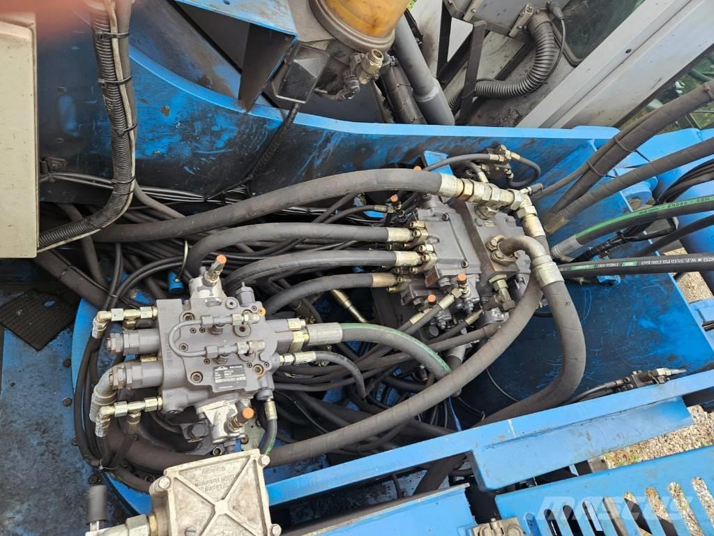 Fuchs MHL 340 Gravemaskiner for avfallshåndtering