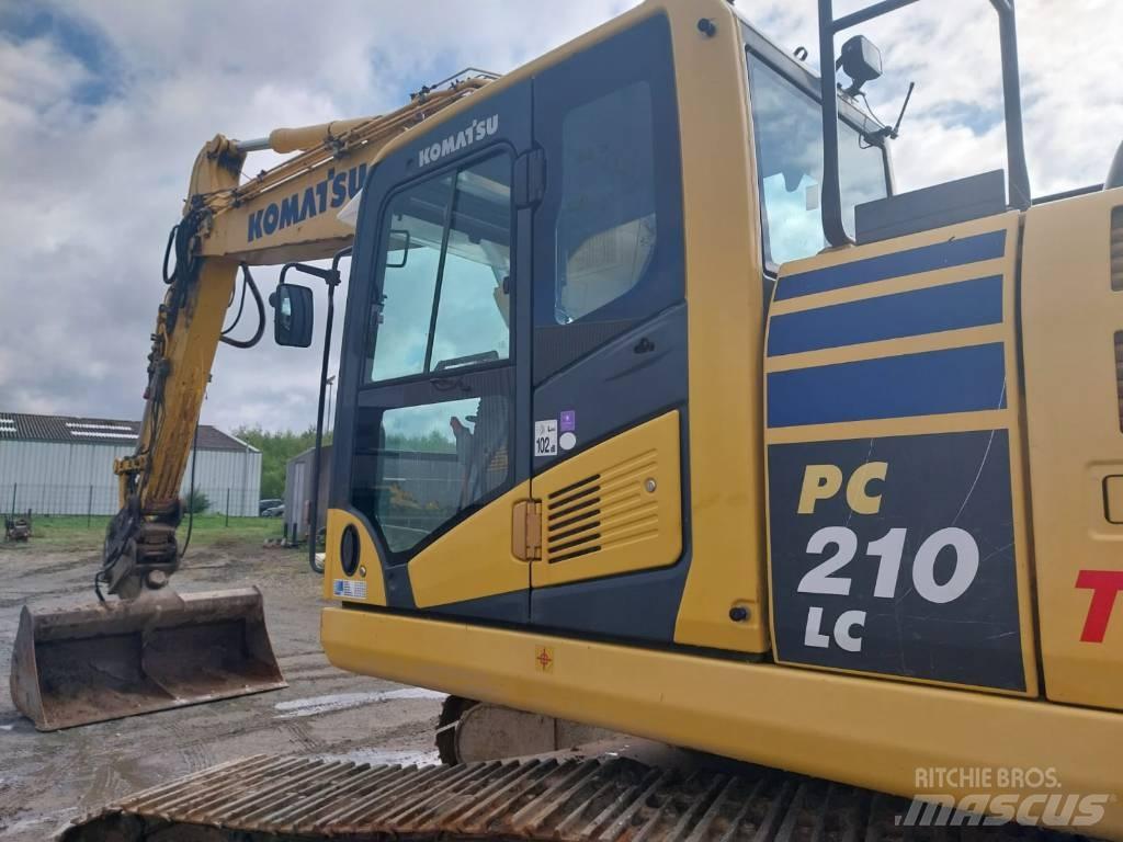 Komatsu PC210LC-10 Beltegraver
