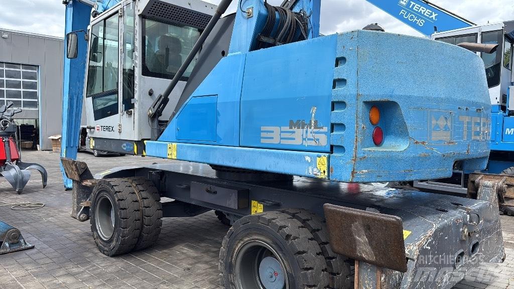 Fuchs MHL 335 E Gravemaskiner for avfallshåndtering